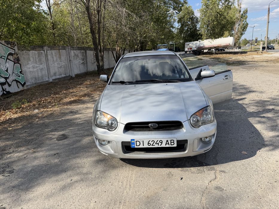 Subaru impreza 1.6 газ/бензин автомат полный привод