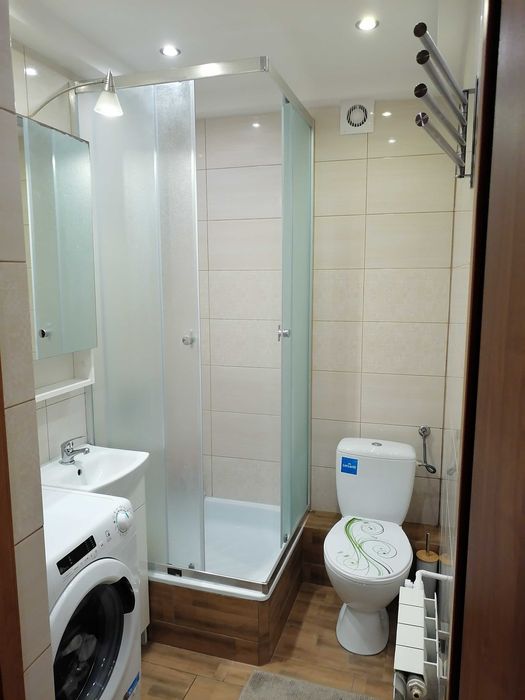 Mieszkanie własnościowe bezczynszowe z wyposażeniem,działką i garażem