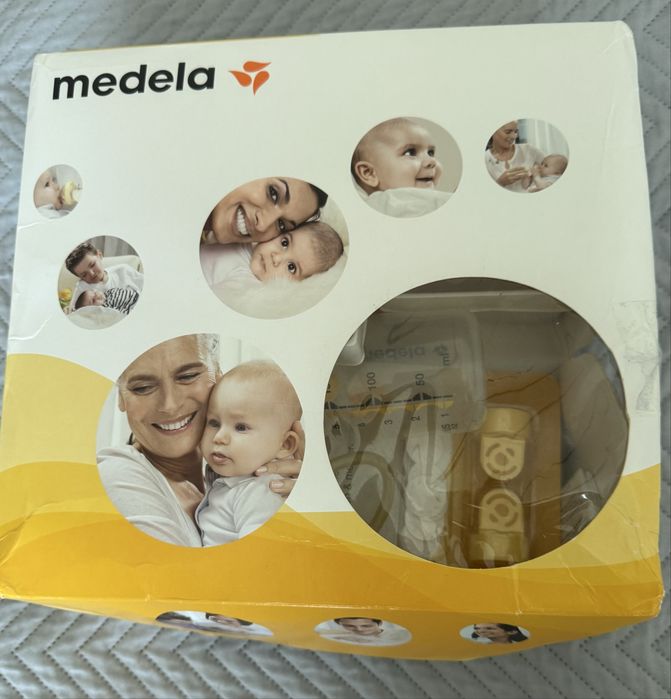 Medela swing електричний молоковідсмоктувач + клапани