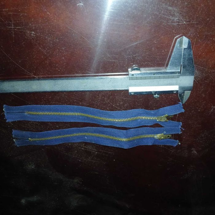 Застібка швейна латунна.