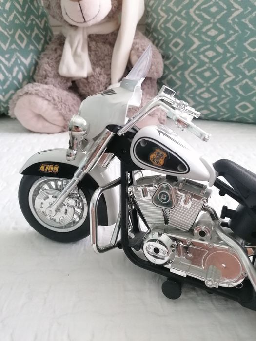 Brinquedo mota de polícia com som e luzes