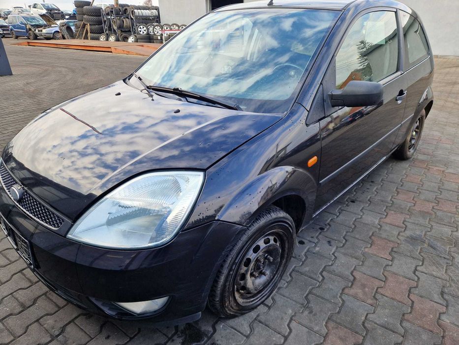 Lampa przód przednia lewa Ford Fiesta MK6 02-05