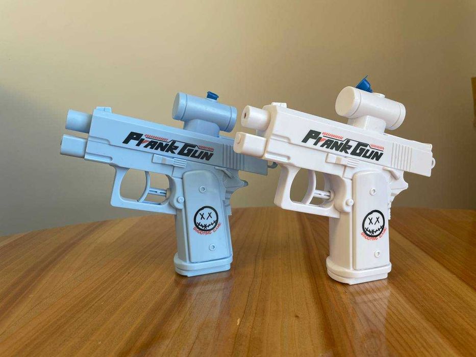 Жартівливий водяний пістолет двосторонній бластер Prank Gun для розіграшів