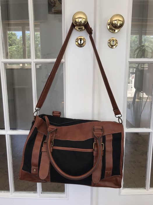 Mala vintage preta e castanha