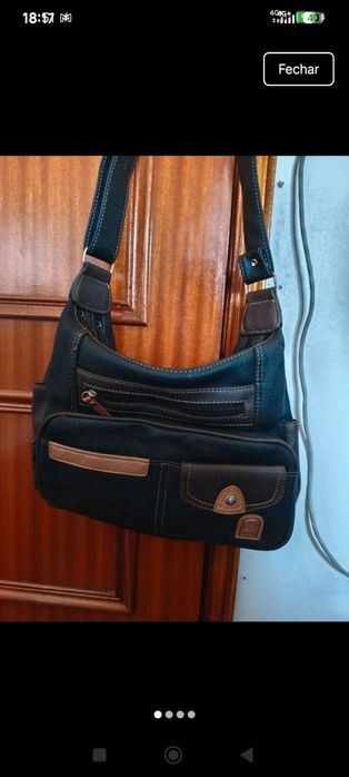 Mala com bolsos e muita arrumação, em excelente estado