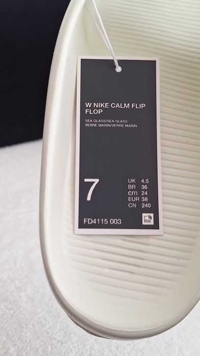 Тапки W Nike Calm Flip Flop,  FD4115 003 US7 EU38  24cm