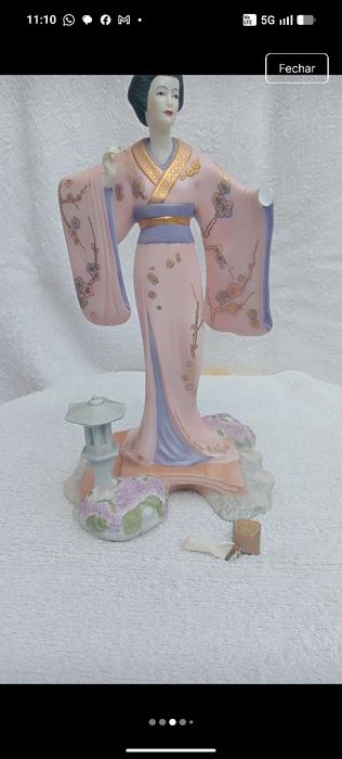 Estatueta de porcelana
