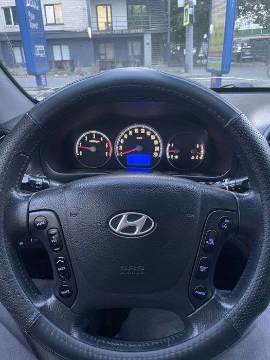 Hyundai Santa FE 2009 VIN KMHSH81WP9U445683 фото оголошення 7 з 8