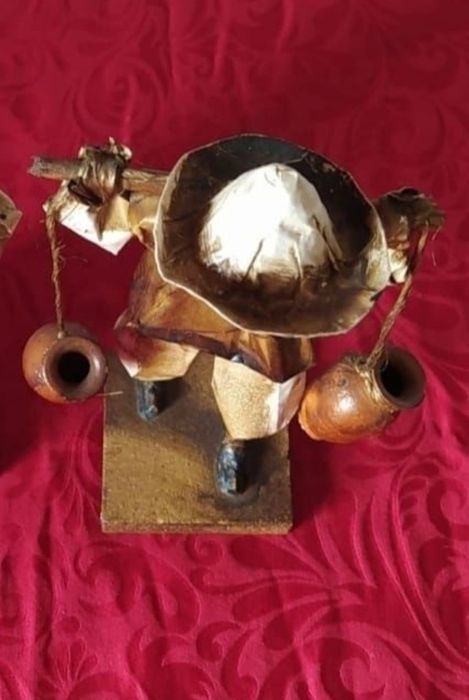 Escultura em papel marche