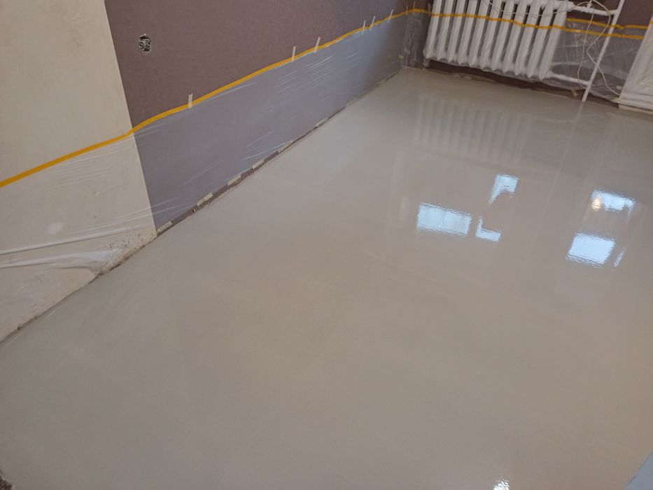 Самовирівнююча стяжка. Стяжка. Ламінат. Вирівнювання підлоги