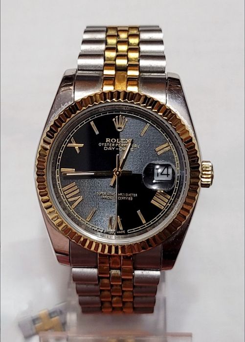 Швейцарские часы Rolex в белом цвете с золотом корпус из нерж.стали механизм quartz выпуск Swiss 80х годов марка времён ссср