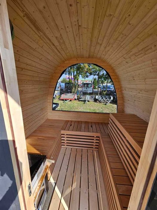 Sauna ogrodowa z piecem opalanym drewnem panorama oświetlenie
