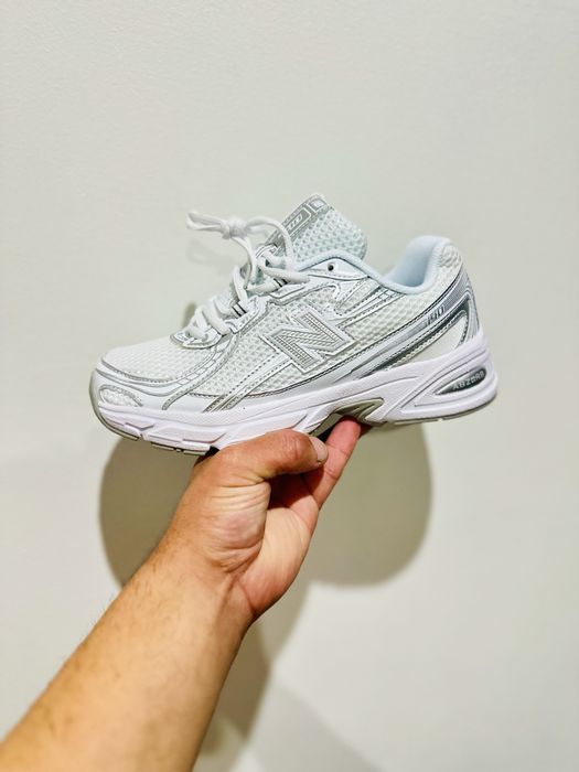 NB 740 branco e cinza, azul e branco