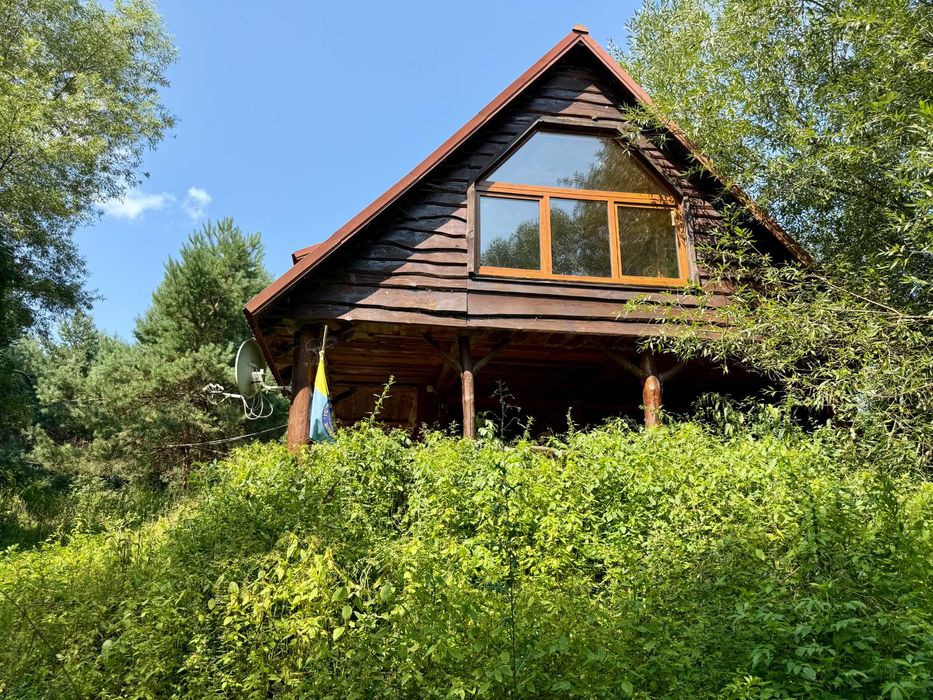 Розплідник «Енейко» з житловим будинком та ділянкою 0.72 га з озером