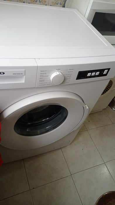 Máquina de lavar roupa e secar roupa