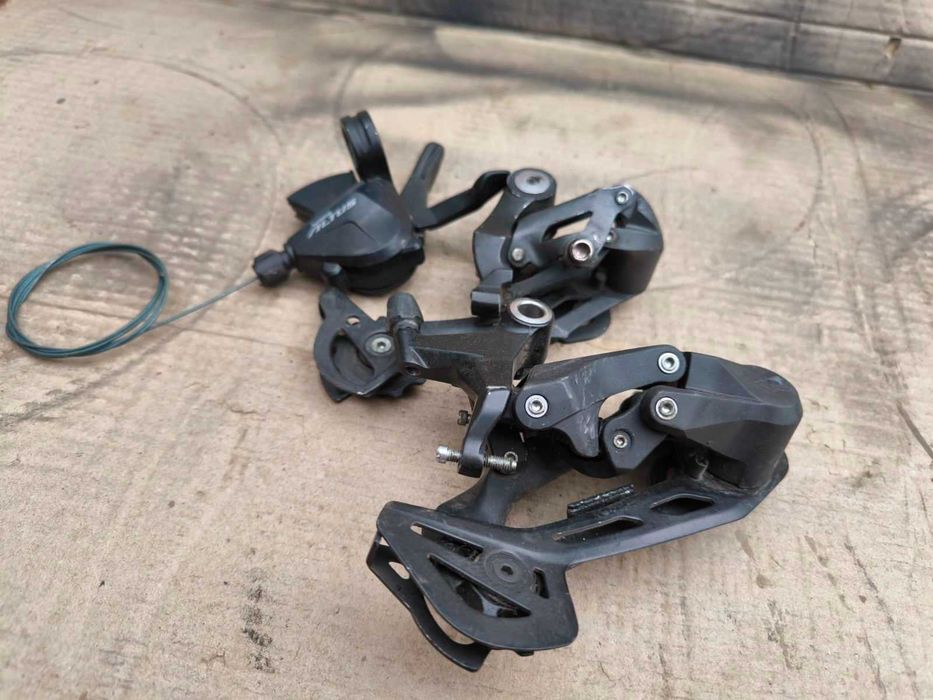 Переключатель скоростей Shimano Acera, Altus, Cues