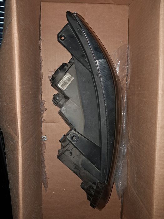 Farol kia sorento 2011