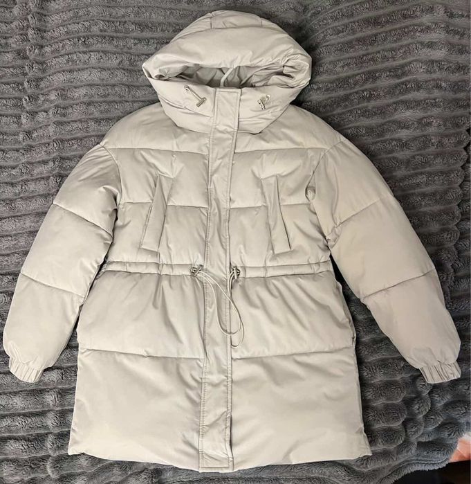 Тепла пухова куртка