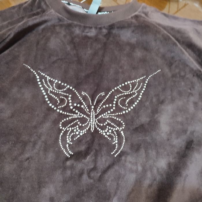 Нова кофта шоколадного кольору.