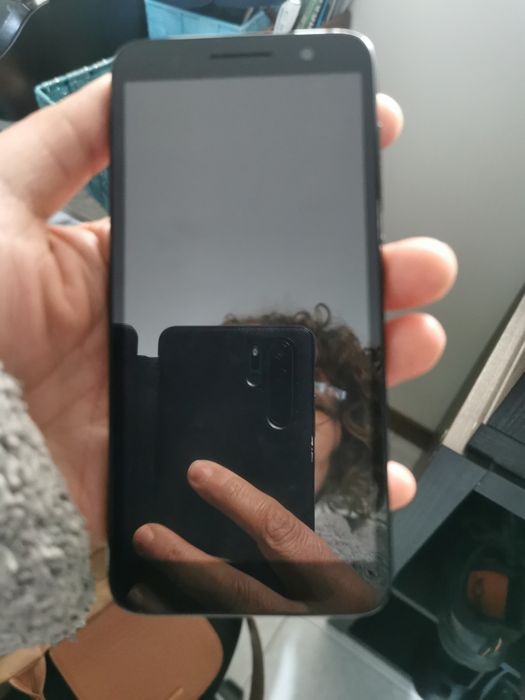 Telefone portátil alcatel