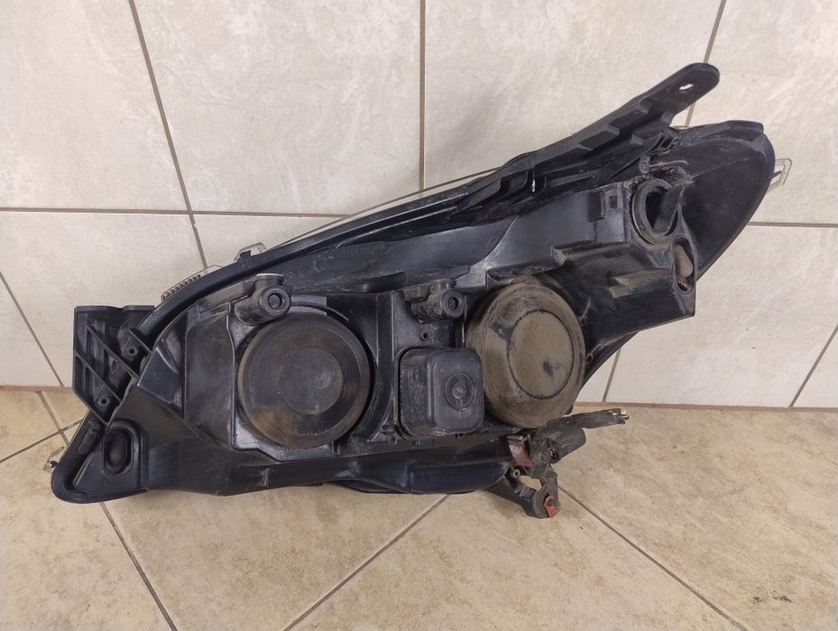 Opel Astra H 03-12 lampa reflektor prawy przód Europa wysyłka