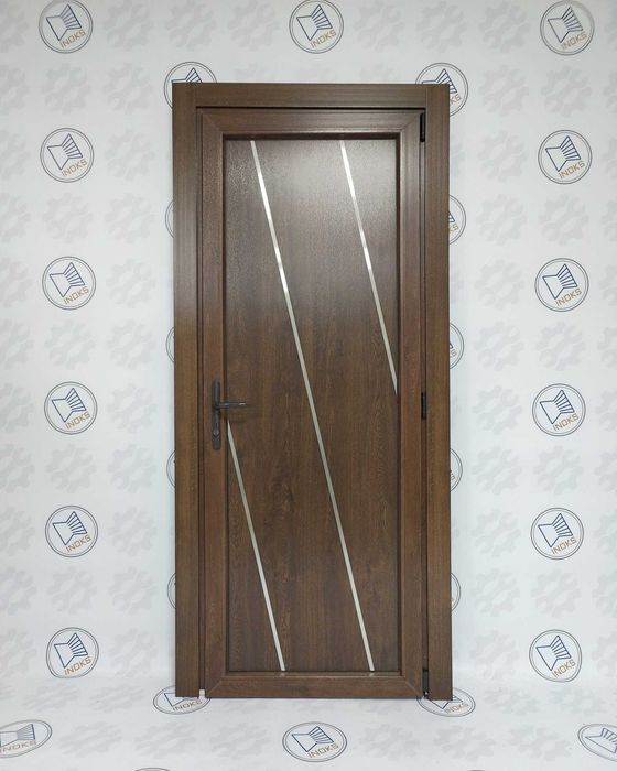 Двері міжкімнатні та вуличні з металопластику INOX09 горіх