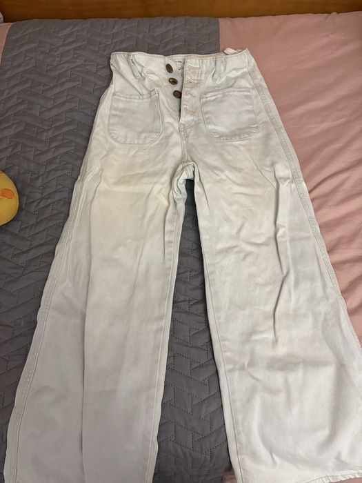 Calças de ganga super elegabtes com botões dourados