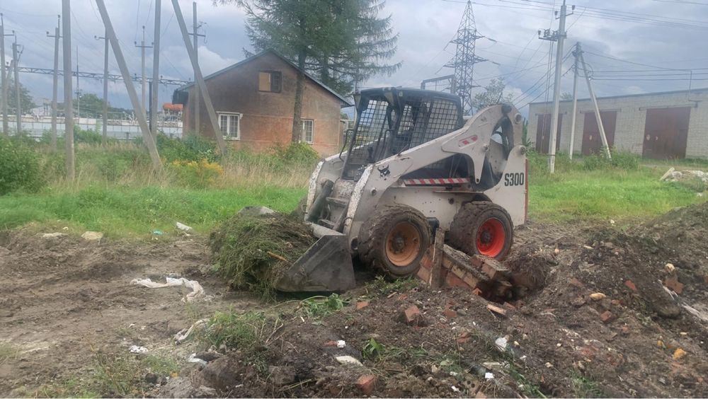 JCB.екскаватор бобкат