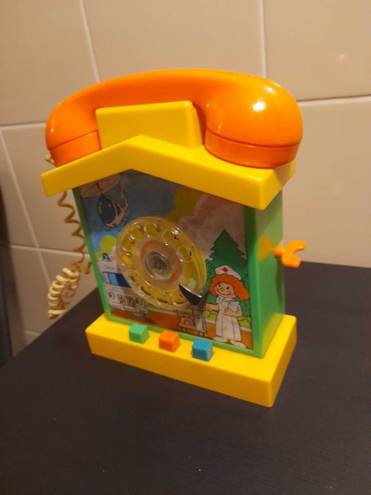 Brinquedo antigo telefone mealheiro
