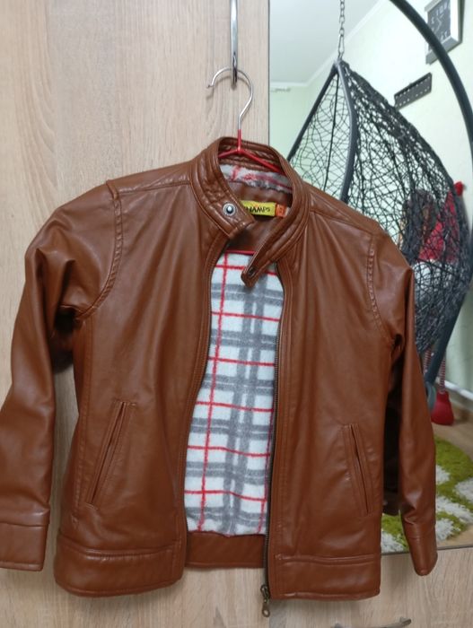 Утеплена кожана куртка та джинсовка