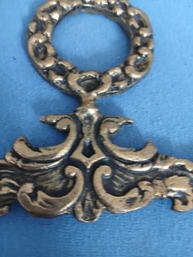 Stare mosiezne zakonczenie do lampy zegara