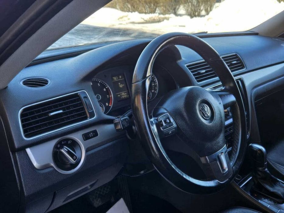 Volkswagen Passat Wolfsburg Edition      2014