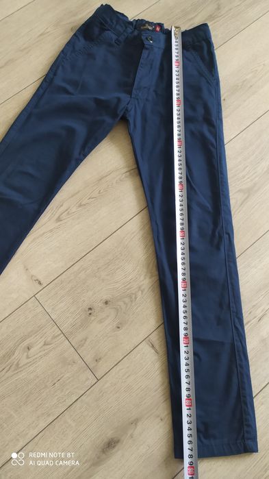Штани   сині   .