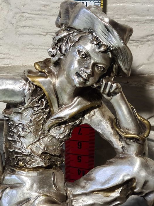 Estatua de prata laminada