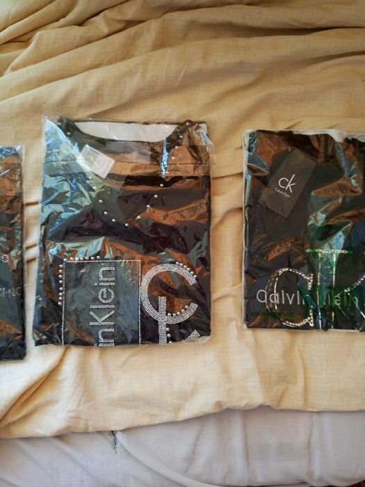 Футболки женские