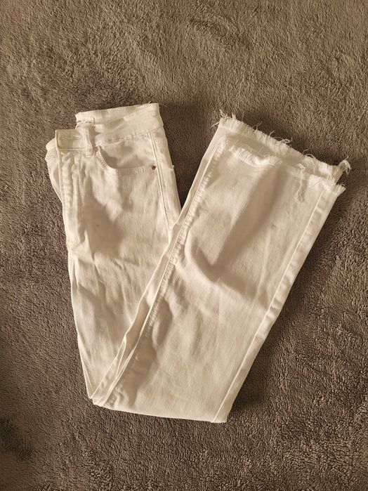 calças de ganga branca