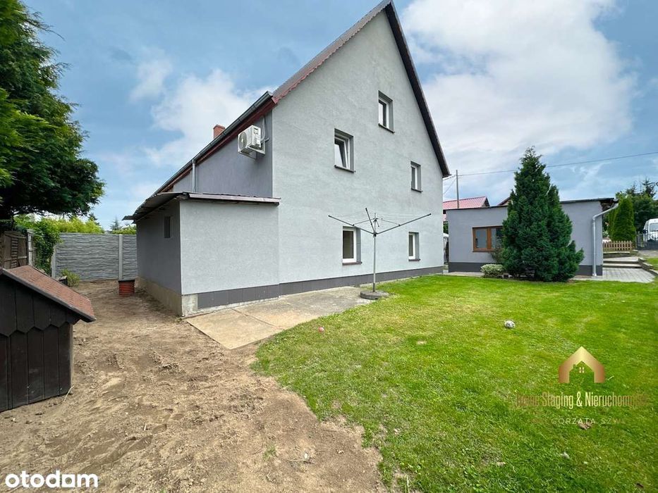 Bliźniak z garażem wolnostojącym i pomieszczeniem np. pod lokal
