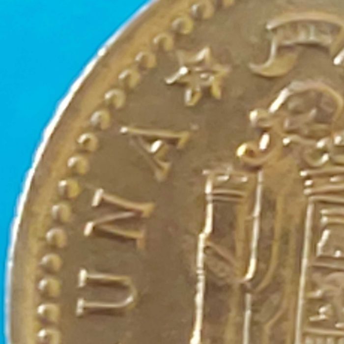 Una Peseta de 1975 com *78* na estrela