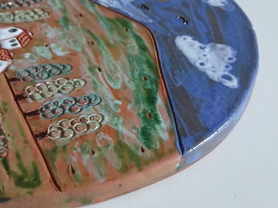 Prato decorativo em barro pintado