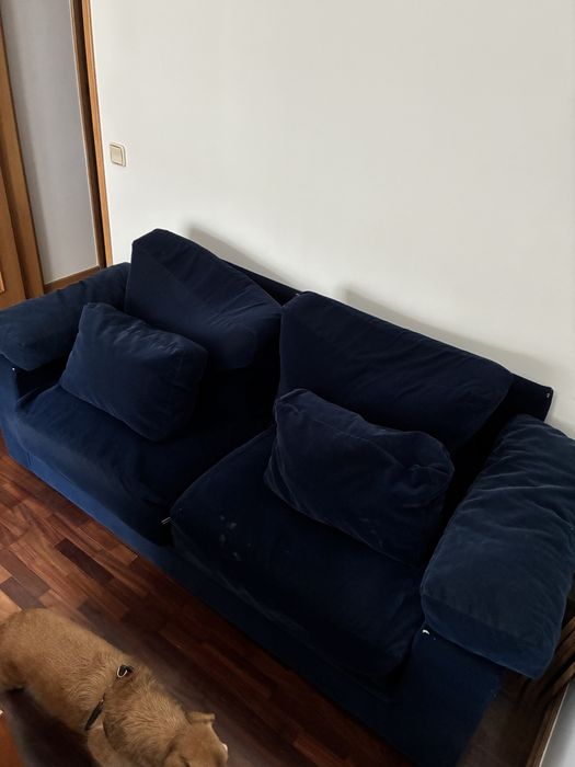 Sofá cama azul usado