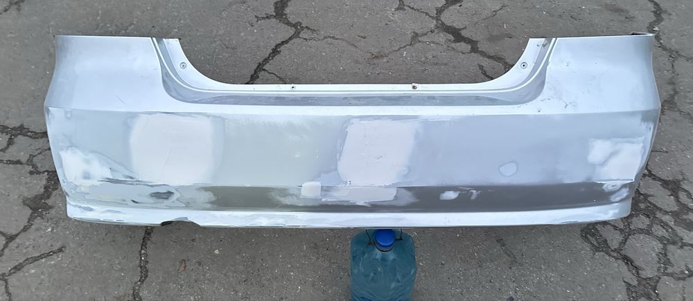 Бампер задній Chevrolet Aveo T250