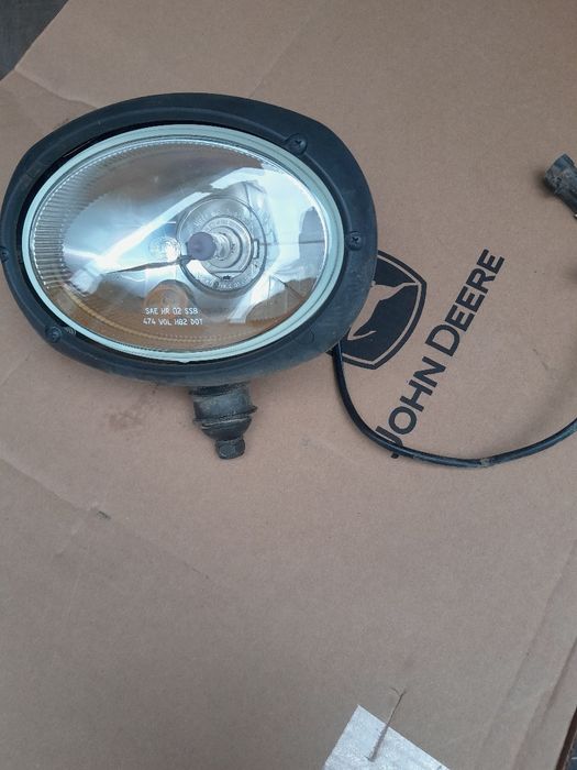 Dwa oryginalne reflektory John Deere RE229111