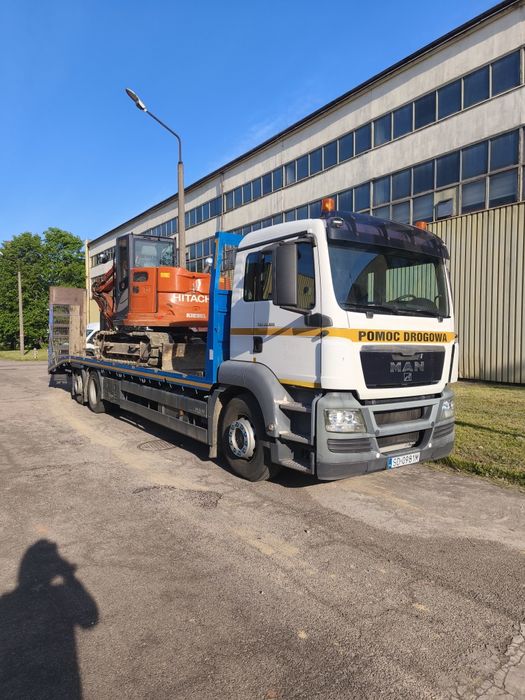 Transport maszyn pojazdów pomoc drogowa
