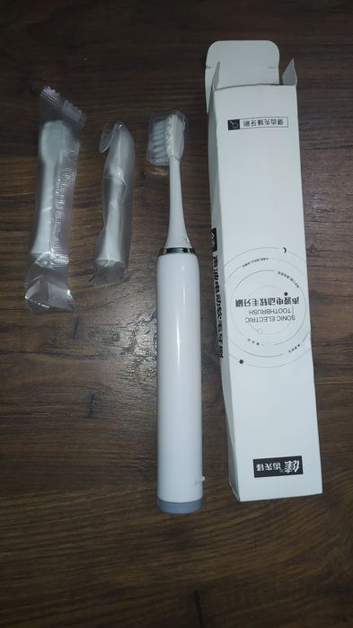 Вібраційна зубна щітка