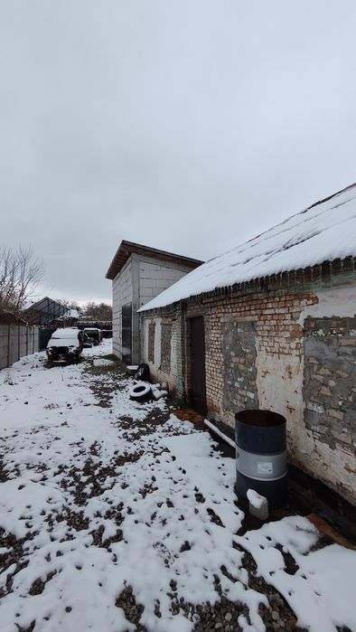 Дом на Гданцевке ул. Алексеенко 16 (возможно СТО).