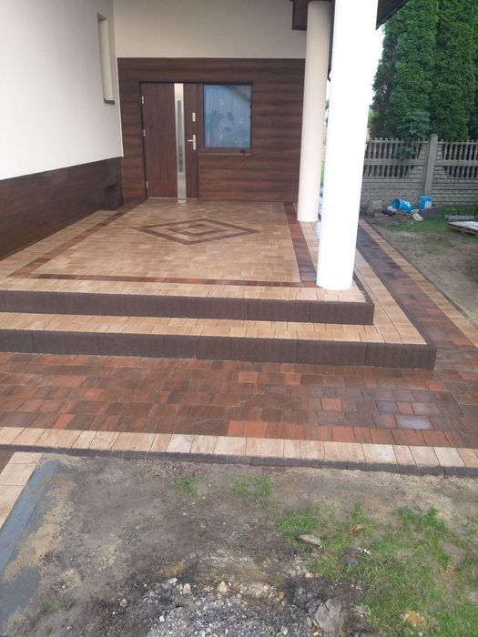 Układanie kostki brukowej i montaż ogrodzeń