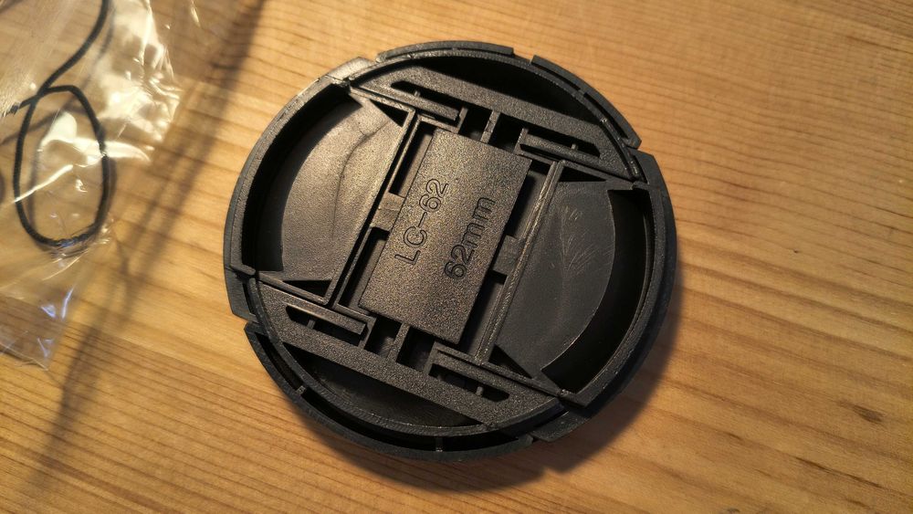Tampa objectiva de 62mm (para máquina fotográfica)