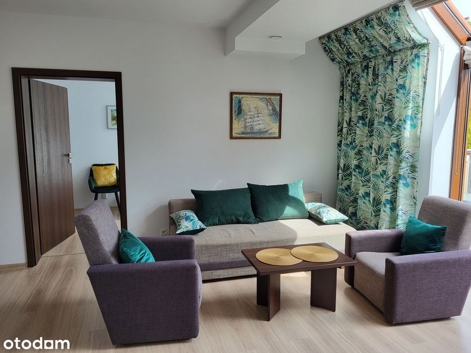 Przestronny apartament z balkonem i windą nad jeziorem Pluszne