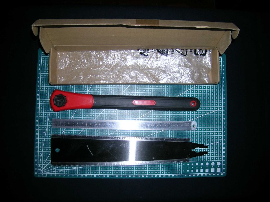 Японская ручная пила с двойной кромкой.