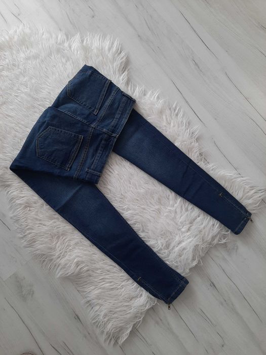Piękne jeansy rurki wysoki stan zamki na nogawkach XS 34
